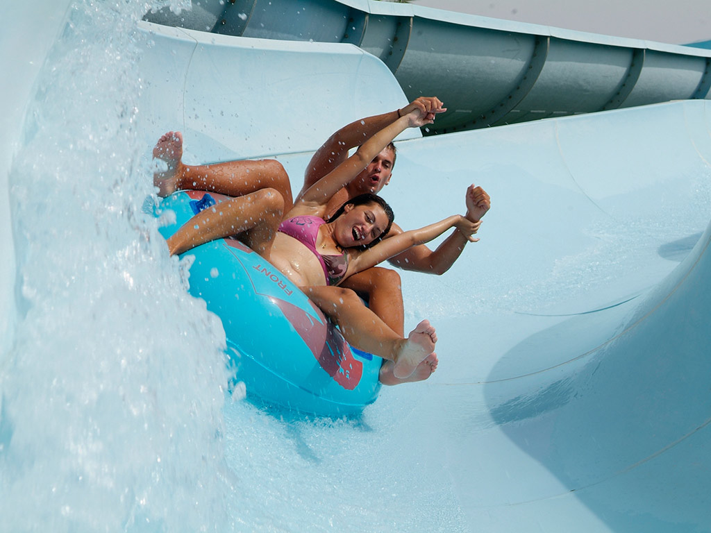 Family enjoying waterpark activities - fun things to do with kids